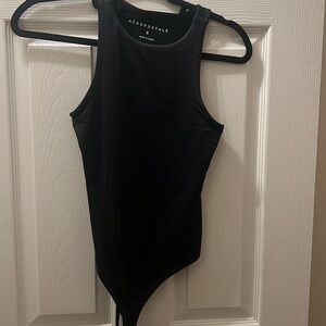 Black high neck body suit